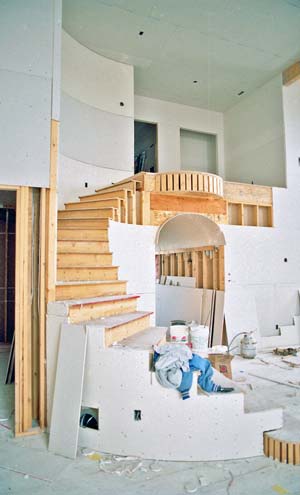 Custom Curved Stairs inside custom house.