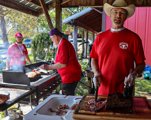 Joel slices the prime rib 1", 2" or 3," as  in the case of Keith Berkeley, DVM and David Richardson.