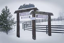 Our Ranch Sign on Muskrat Road in January during Snow Storm